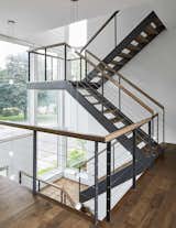 Staircase, Cable Railing, and Wood Tread  Photo 9 of 16 in Canal Terrace House by Michelle McKenna