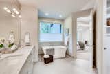 Large master bathroom with dual sinks and a soaking tub. 