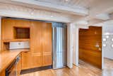 Kitchen, Wood Cabinet, Track Lighting, Refrigerator, and Dishwasher  Photo 8 of 18 in Portland Float Home by Virtuance Real Estate Photography