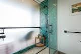 Modern, accessible shower featuring Mercury Mosaics handmade tile. 