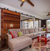 Custom-built mahogany doors make a statement in the living room & give maximum privacy.