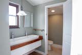 Wetstyle vessel sink, custom designed walnut vanity   Photo 5 of 9 in The Scrivo Condo by Matt Scrivo