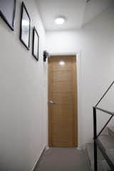 Private entrace corridor to each studio apartment 