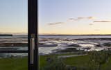 Outdoor, Back Yard, Gardens, Flowers, Grass, Hardscapes, Wood Patio, Porch, Deck, Large Patio, Porch, Deck, and Stone Patio, Porch, Deck Low tide at sunset view  Photo 12 of 13 in Bay of Fundy house by Paul French
