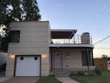 Exterior, Brick Siding Material, Flat RoofLine, Mid-Century Building Type, House Building Type, and Tile Roof Material  Photo 1 of 33 in putting an art moderne back together by Jacob Peregrin