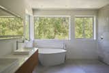 The master bathroom is also surrounded by the tree tops.
