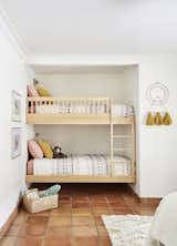 We converted an old closet to add built in twin bunks, utilizing space and creating a fun nap nook.