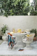 This small corner of the backyard was transformed into a chic boho entertaining dining space.