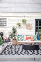 Mixing and matching patio furniture and accessories are the perfect way to tie a space together.