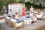 A backyard fire pit is the perfect space for summer lounging, or late night entertaining.