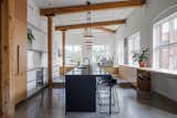 Ceiling lighting : Systemalux / Pendant lighting : Lambert & fils / Granit countertops : Stone age / Stainless counter top : Solufab / Cabinetry : Atelier 13 - custom design by La Firme / Stools : Lattitude Nord