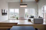Sofa : EDB / Coffe Table : La Firme Deisng & Construction / Cabinetry : Atelier 13 - custom design by La Firme /Pendant lighting : Lambert & fils