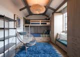 Kids Bunk Room with cypress wood panels in a beachy blue granite finish