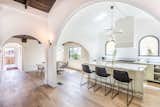 Transition inside to an open concept living, kitchen and dining areas seamlessly blended yet defined