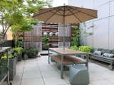The terrace is perfect for cooking, gardening, and gathering with family and friends.
