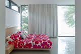 Kids Room, Bed, Teen Age, Concrete Floor, Bedroom Room Type, and Girl Gender  Photo 19 of 24 in Lac-Brome house by Cyr Cathcart interior designers