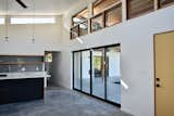 Great Room to 12 foot sliding patio door, hallway to beds and bath