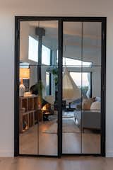 Custom 8ft metal double sided mirrored French doors  amplify the gorgeous views, expand the sense of space and provide privacy from main living area.  Search “谷歌收录排名【电报e108⒊⒏】google收录外推.vft” from Casita Ola, a Pt. Dume bungalow steps from the Malibu surf....
