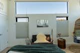 Abundant natural light and views from primary bedroom.  3ft by 12ft clerestory window.