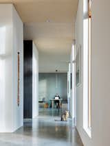 Hallway and Concrete Floor Hallway 1  Photo 11 of 33 in Oleksiuk Residence by Maple Pike Studio