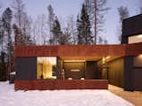 Exterior, Metal Siding Material, Wood Siding Material, House Building Type, and Flat RoofLine Exterior Rolling Wood Screen 1  Photo 2 of 33 in Oleksiuk Residence by Maple Pike Studio