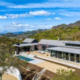 Panoramic vineyard, valley floor and mountain views.