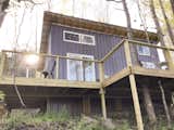 Exterior, Metal Roof Material, A-Frame RoofLine, Tiny Home Building Type, and Metal Siding Material Sunset at Case Rock Cabin  Photo 1 of 10 in Case Rock Cabin by Rachel Evans