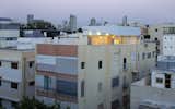 Exterior, Metal Roof Material, Metal Siding Material, and Apartment Building Type View from neighboring building  Photo 2 of 13 in Light Roof Extension by Dan Koniak