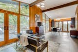 Small family room off of kitchen opens to the dining room.  Previously it was switched.