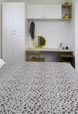The 450-sf studio units feature built-in wardrobes and desks.