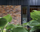 View of brick and metal fascia from south garden