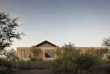 Exterior, A-Frame RoofLine, House Building Type, and Concrete Siding Material the project integrates the construction to its natural landscape.  Photo 1 of 11 in Casa Moulat by CCA | Centro de Colaboración Arquitectónica