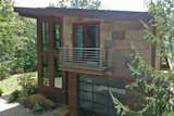 Exterior, Cabin Building Type, Shingles Roof Material, Shed RoofLine, and Stone Siding Material  Photo 3 of 26 in Watershed Resort #3 - Mountain Modern by Tim Goodwin