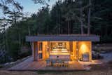 Exterior, Green Siding Material, Green Roof Material, Wood Siding Material, Flat RoofLine, Cabin Building Type, and Glass Siding Material  Photo 3 of 14 in Lone Madrone Cabin by Heliotrope Architects