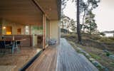 Exterior, Wood Siding Material, House Building Type, Cabin Building Type, Glass Siding Material, and Flat RoofLine  Photo 12 of 14 in Lone Madrone Cabin by Heliotrope Architects