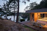 Exterior, Glass Siding Material, Shed RoofLine, Flat RoofLine, House Building Type, Shingles Roof Material, Wood Siding Material, and Cabin Building Type  Photo 6 of 14 in Lone Madrone Cabin by Heliotrope Architects