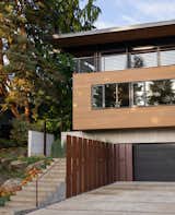 Exterior, House Building Type, Shingles Roof Material, Wood Siding Material, Flat RoofLine, Concrete Siding Material, and Glass Siding Material  Photo 19 of 74 in Quantum Clad Windows & Doors by Quantum Windows & Doors