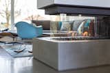 Three-sided custom concrete fireplace | Grandview Woodland