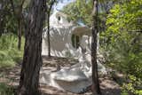 Exterior and House Building Type Describing what the Bloom House looks like is tricky; even architect Charles Harker won't reveal what the home is intended to depict.  Photo 1 of 5 in Austin’s Weirdest Rental Is a Psychedelic Experience Totally Worth the Trip