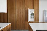 Harding went for Fisher & Paykel appliances, which disappear behind a wall of Tasmanian oak joinery. 