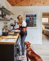 Highland Bungalow by Lauren Wesley Spear kitchen with open steel shelves and wood countertop