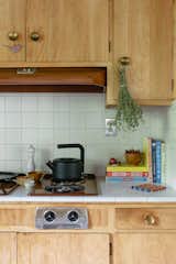 The wood-and-white kitchen is one of the most beloved rooms in the home.