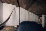 Their cozy mezzanine nook is used for naps, yoga, or meditation.