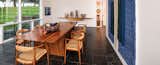 Dining room - table by Joyce and Edgar Anderson, chairs by Hans Wegner, textile wall art by Mariette Rousseau-Vermette