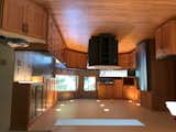 Sorry this photo is flipped! This page was determined to keep it that way!
Now you can see the doorway and peninsula to the left of the refrigerator and the lower counter transitioning to the living room off to the right side of the kitchen. 