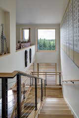 Staircase, Metal Railing, Wood Tread, Wood Railing, and Cable Railing  Photo 5 of 5 in Pumpkin Ridge Passive House by Scott Edwards Architecture