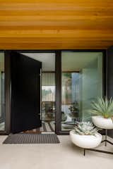 Doors, Exterior, Swing Door Type, and Metal  Photo 6 of 17 in Cedar Island Residence by Scott Edwards Architecture