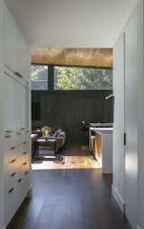 Hallway and Medium Hardwood Floor  Photo 13 of 17 in Cedar Island Residence by Scott Edwards Architecture