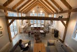 Exposed hemlock beams form a series of proscenia that distribute the roof load. 