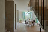 Staircase in La Posmoderna home renovation by FMT Estudio